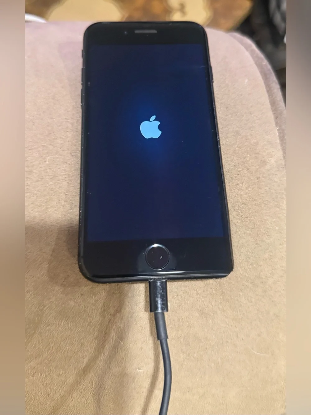 Retired working iPhone 7. Matte Black. Including a charging cord.